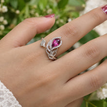 Load image into Gallery viewer, Swarovski crystal ring with pink center stone worn on a model's finger | MysticFlavia
