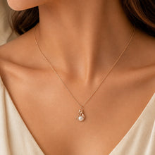Load image into Gallery viewer, Natural pearl silver necklace worn elegantly on a model | MysticFlavia
