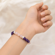 Load image into Gallery viewer, Rose Quartz &amp; Amethyst Silver Bead Bracelet 8MM worn on the wrist in a lifestyle setting
