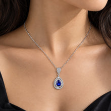 Load image into Gallery viewer, Blue Sapphire Teardrop Pendant Necklace worn on model, 925 Sterling Silver by MysticFlavia
