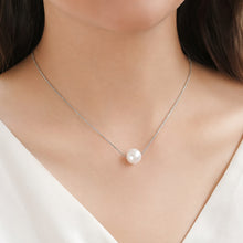 Load image into Gallery viewer, MysticFlavia single white pearl pendant silver necklace worn on a model
