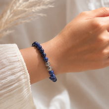 Load image into Gallery viewer, Woman wearing Natural Sodalite Faceted Stone Silver Bead Bracelet 8MM with 925 sterling silver beads by MysticFlavia
