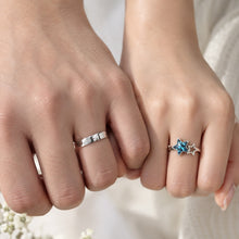 Load image into Gallery viewer, Blue star crystal silver ring worn on a woman's finger
