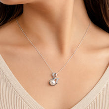 Load image into Gallery viewer, Natural pearl swan pendant necklace worn elegantly on a model | MysticFlavia
