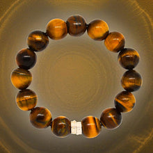Load image into Gallery viewer, Tiger eye double flat silver bracelet 12mm on golden textured surface, top view styling
