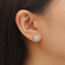 Load image into Gallery viewer, Moissanite floral cluster stud earrings worn on a model ear for a close-up view
