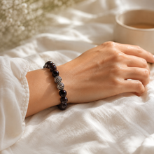 Load image into Gallery viewer, Garnet Birthstone Silver Bead Bracelet 12mm worn on a woman's wrist, featuring natural garnet gemstone beads and 925 sterling silver designer beads by MysticFlavia.
