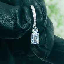 Load and play video in Gallery viewer, Dangling Princess Cut Zircon Silver Earrings
