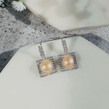 Load and play video in Gallery viewer, Pink Natural Pearl Paved Zircon Silver Earrings
