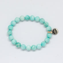 Load image into Gallery viewer, Natural amazonite bracelet with 925 sterling silver charm on right side, top view showing teal green beads, white background

