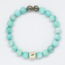 Load image into Gallery viewer, MysticFlavia amazonite bracelet with mint green round beads, two carved silver beads and square brand tag, white background

