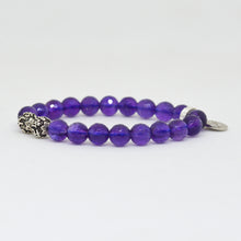 Load image into Gallery viewer, Side profile of violet bead bracelet with silver detailing displayed on white background
