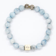 Load image into Gallery viewer, Aquamarine Birthstone bracelet with pale blue round beads, two carved silver beads on top and square infinity charm, white background

