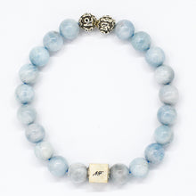 Load image into Gallery viewer, MysticFlavia Aquamarine Birthstone bracelet with soft blue beads, carved 925 sterling silver beads and square brand tag, white background

