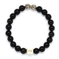 MysticFlavia black obsidian bracelet 8mm flat view with two engraved silver accent beads at top and white square infinity bead at bottom