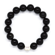 MysticFlavia black obsidian bracelet 12mm flat view with white square infinity silver bead at bottom on white background
