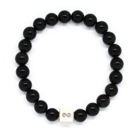 MysticFlavia black obsidian bracelet 8mm flat view with white square infinity silver bead at bottom on white background
