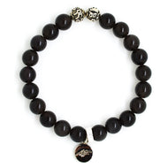 MysticFlavia black obsidian bracelet 8mm flat view with two engraved silver accent beads at top and dark round brand charm at bottom
