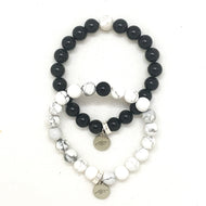 Black Obsidian and White Howlite couple bracelet set with round beads and silver MF charms, MysticFlavia