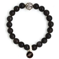 MysticFlavia black obsidian bracelet 12mm flat view with single engraved silver accent bead at top and dark round brand charm at bottom
