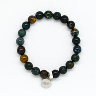 MysticFlavia bloodstone bracelet bracelet with dark green-red speckled beads and silver round tag, white background
