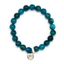 Load image into Gallery viewer, Blue Apatite Stone Flat Silver Bead Bracelet 8mm by MysticFlavia featuring natural blue apatite gemstone beads with a flat 925 sterling silver bead and logo charm on a white background.
