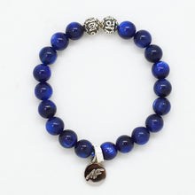 Load image into Gallery viewer, Blue Kyanite Stone Silver Bead Bracelet 8mm with natural round blue kyanite beads, decorative silver spacer beads and silver charm on a white background.
