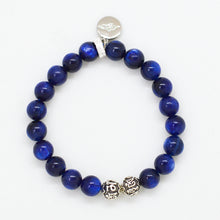 Load image into Gallery viewer, Back view of Blue Kyanite Stone Silver Bead Bracelet 8mm featuring polished blue kyanite gemstone beads, silver spacer beads and a silver logo charm.
