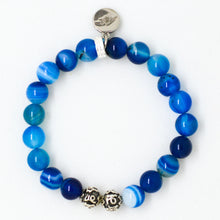 Load image into Gallery viewer, Blue Striped Agate bracelet close-up showing 925 sterling silver charm engraved with MF logo


