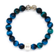 MysticFlavia blue tiger eye bracelet with 925 sterling silver filigree beads and infinity cube, white background
