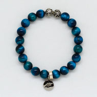 MysticFlavia blue tiger eye bracelet with 925 sterling silver beads and round charm, white background