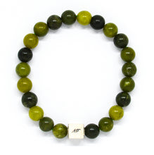 Load image into Gallery viewer, Top view of Canadian Jade Infinity Silver Bead Bracelet 8mm with polished green jade beads and sterling silver infinity bead
