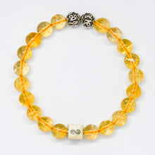 Load image into Gallery viewer, Citrine bracelet with natural citrine round beads and silver accent bead on a white background
