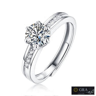 Moissanite solitaire ring in 925 sterling silver with a round center stone and sparkling stone-set band