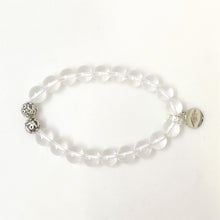 Load image into Gallery viewer, MysticFlavia clear quartz stone silver beads bracelet 8MM with twin ornate silver beads and brand charm, oval flat lay
