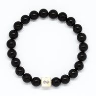 MysticFlavia black tourmaline bracelet with 925 sterling silver infinity cube bead, white background