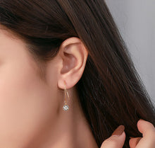 Load image into Gallery viewer, White Gold Turkish Evil Eye Dangling Silver Earrings
