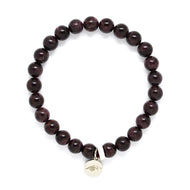 Garnet Birthstone Flat Silver Bead Bracelet 8mm by Mystic Flavia on a white background with polished natural garnet gemstone beads.