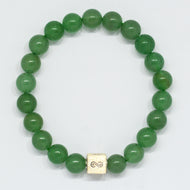 MysticFlavia Green Aventurine bracelet with smooth green beads and a 925 sterling silver square charm engraved with an infinity symbol, flat lay.