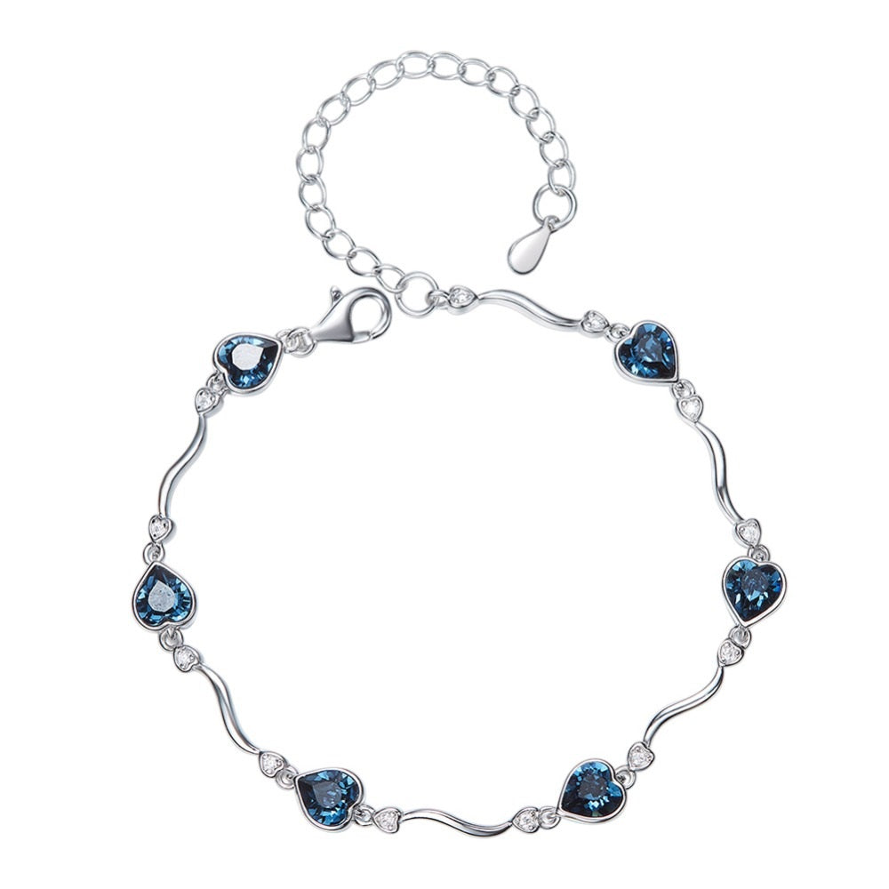 Swarovski Iconic Swan Bangle Bracelet Rhodium Plated Blue Crystal 5660595 -  First Class Watches™ AUS