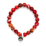 Hued Red Jasper Flat Silver Bead Bracelet 8MM by MysticFlavia featuring natural hued red jasper stone beads with a flat silver bead accent.
