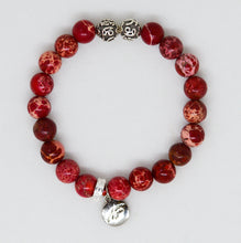 Load image into Gallery viewer, Top view of Hued Red Jasper Stone Silver Bead Bracelet 8MM with natural red jasper beads and premium silver bead accents | Mystic Flavia
