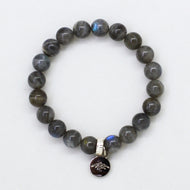 Labradorite Flat Silver Bead Bracelet 8mm with natural labradorite gemstone beads and 925 sterling silver flat bead by Mystic Flavia on a white background.