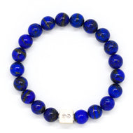 MysticFlavia lapis lazuli bracelet 8mm flat view with white square infinity silver bead at bottom on white background
