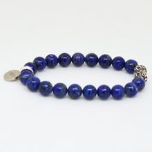 Load image into Gallery viewer, Lapis lazuli 925 sterling silver bead bracelet 8mm side view showing engraved accent bead and brand charm

