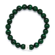 MysticFlavia malachite bracelet 8mm flat view with white square double flat silver bead at bottom on white background