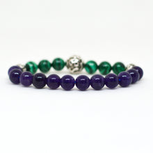 Load image into Gallery viewer, Malachite and Amethyst bracelet flat lay showing 925 sterling silver carved bead detail
