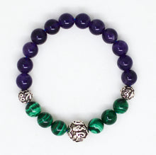 Load image into Gallery viewer, Malachite and Amethyst bracelet close-up showing carved silver beads between green and purple stones
