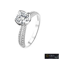 Moissanite ring in 925 sterling silver with round center stone and sparkling stone-set band by MysticFlavia
