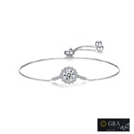 Silver adjustable bracelet with round moissanite flower halo pendant, sliding bolo clasp, GRA certified.